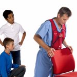 Act+Fast Rescue Choking Weste - Rot, Back Slap Version